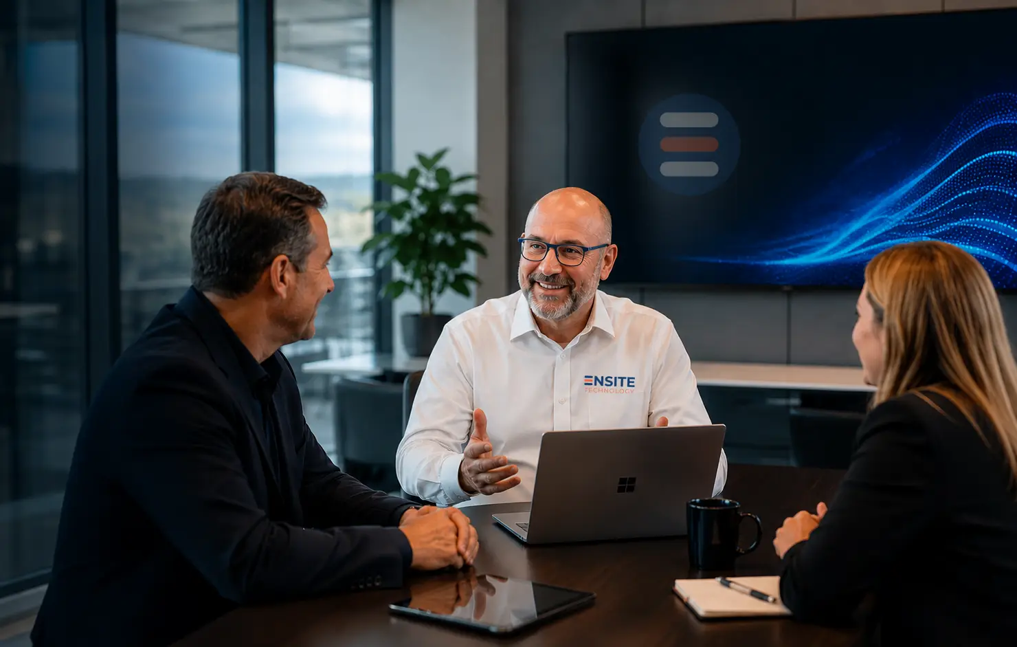 Ernst Karner and clients discussing managed IT services in South Africa